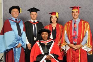 Anne Wafula Graduation in UK while receiving the Honorary Degree, accompanied by lectures 