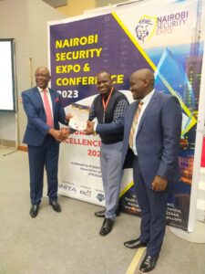 Sheer Logic Management consultants receiving award, background screening company of the year at Nairobi Security Expo
